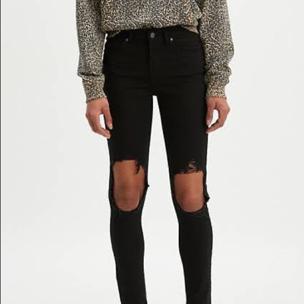 Levi’s 721 high-rise skinny jeans with open knees